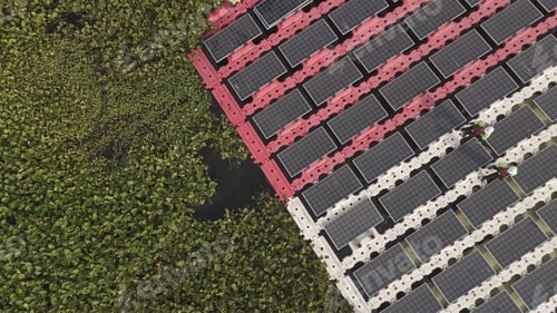 Preview: Floating solar panels providing renewable energy. Aerial view floating on solar cells