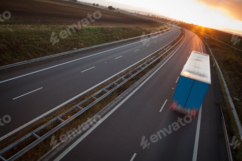 Preview: highway traffic - motion blurred truck on a highway/motorway/spe