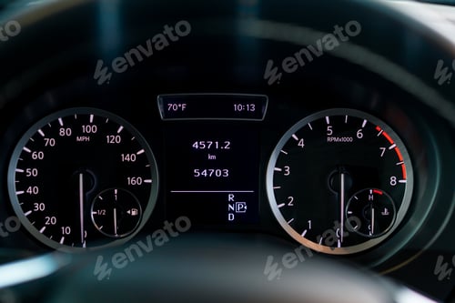 Preview: Close-up of the odometer and dashboard of luxury car with a black interior after detailing