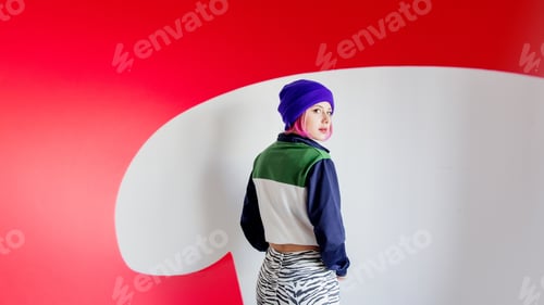 Preview: Young girl in 90s style jacket and twisting red paper
