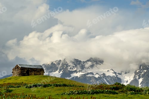Preview: Barn on hill and distant mountains, Mazeri village, Svaneti, Georgia