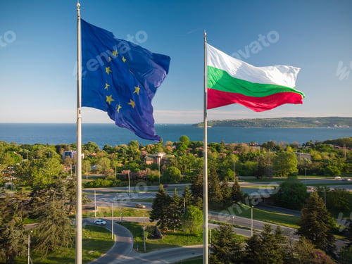 Preview: European Union and Bulgaria flags Against City Varna at summer day