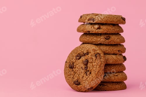 Preview: Stack of Chocolate Chip Cookies on Pink Background