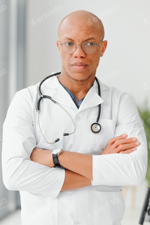 Preview: young male african doctor in hospital.