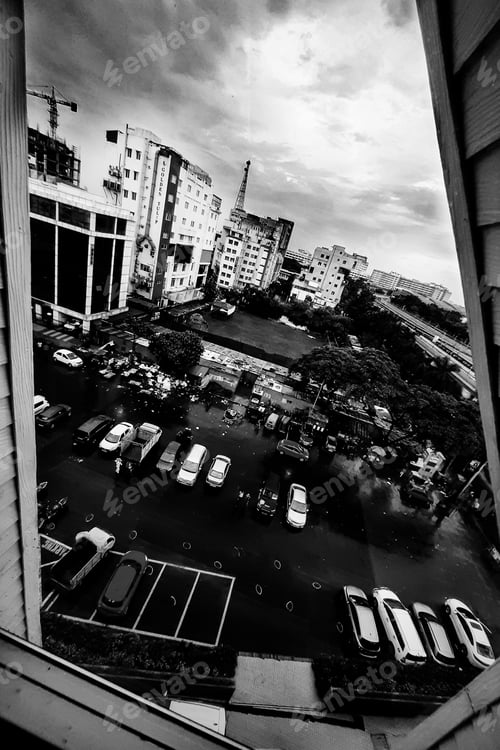 Preview: Grayscale shot of the street view from a window in Kolkata, India.