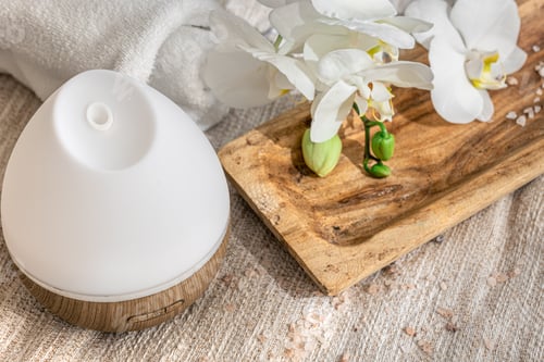 Preview: Modern oil aroma diffuser close up on a blurred background.