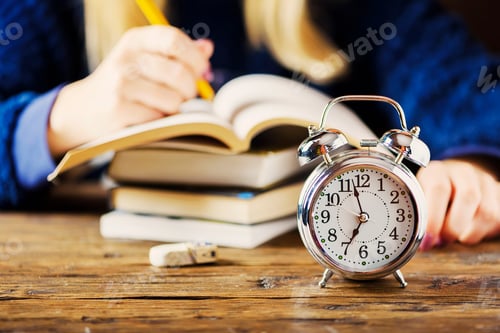 Preview: Stydying concept: student preparing late for his exams