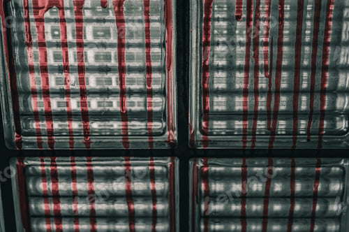 Preview: A glass wall stained with blood, Halloween murder concept.