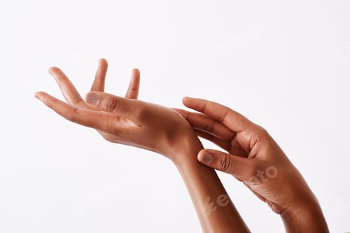 Preview: Studio shot of an unrecognizable womans hands against a white background