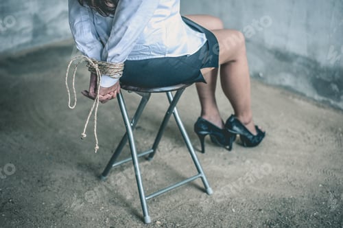 Preview: woman hands bound. Women were handcuffed and Sitting on a chair.woman tied hand to a chair.Crime Con
