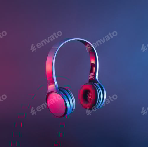 Preview: Headphones or headset in neon light to listen to trending or other contemporary disco music