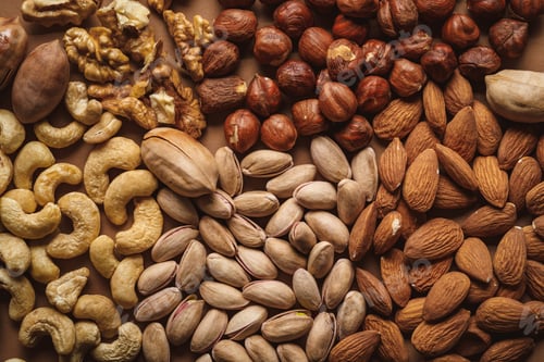 Preview: flat lay with tasty nuts arrangement on brown background