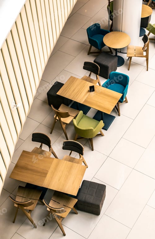 Preview: Tables and chairs in cafe. ontemporary design of bar furnishings