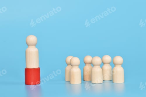 Preview: Wooden doll figure of leader and office staff. Social workers and leader concept.