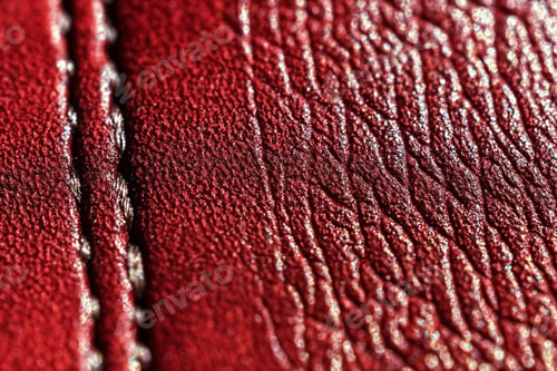 Preview: Close-up of textured red leather showcasing intricate patterns