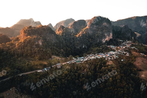 Preview: Mountains and sunset light in the evening at a rural village