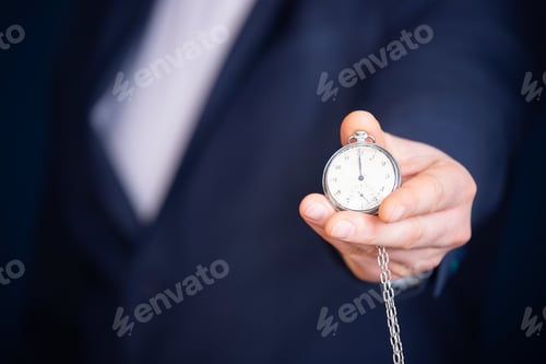 Preview: Businessman with clock in time concept