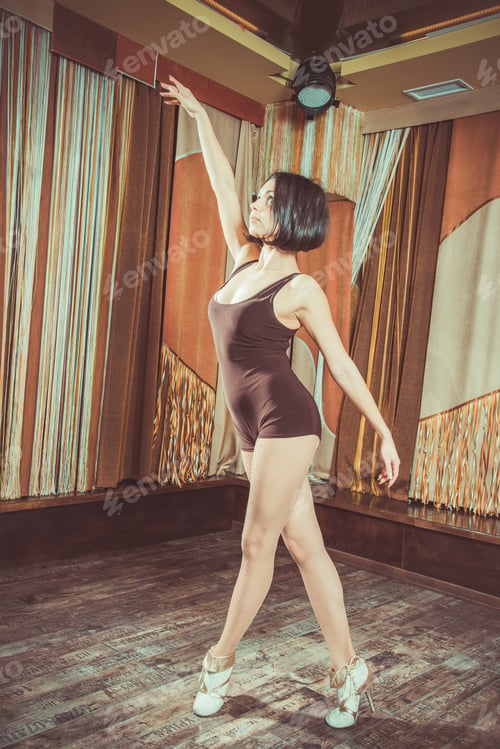 Preview: Woman Warming Up Before Dance Classes