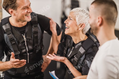 Preview: Couple Talking With Coach before EMS Training