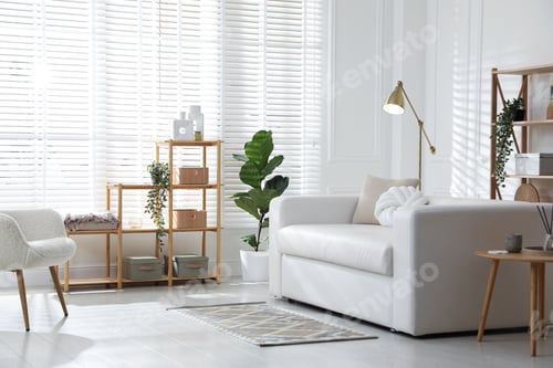 Preview: Stylish shelving unit with decor and sofa in room
