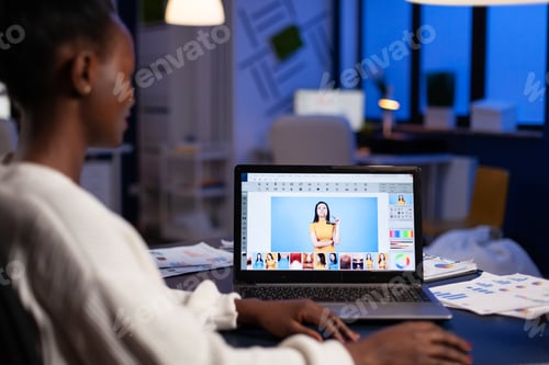 Preview: Creative african american retoucher working at design production