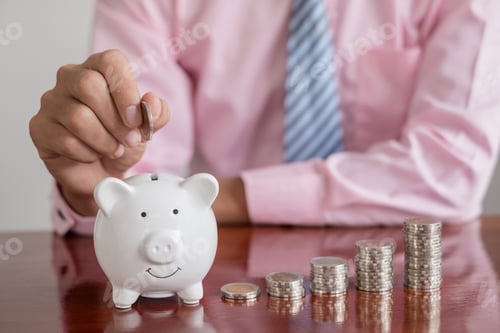 Preview: The hand of a businessman puts coins in a piggy bank, saves money with coins, steps