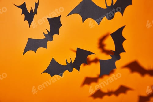 Preview: paper bats with shadow on orange background, Halloween decoration