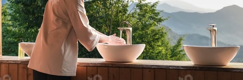Preview: Travel.girl travels mountains,washing her hands glamping view mountains, nature. Unity, mental he