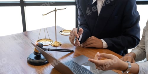 Preview: Business and lawyers discussing contract papers with brass scale on desk in office. Law, legal