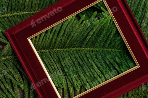 Preview: Christmas picture frame with pine leaf and bauble decor on wood table