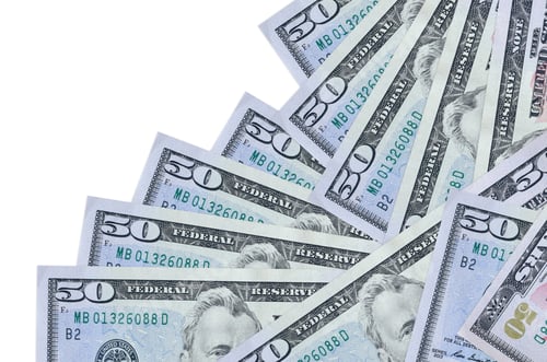 Preview: 50 US dollars bills lies in different order isolated on white. Local banking or money making concept
