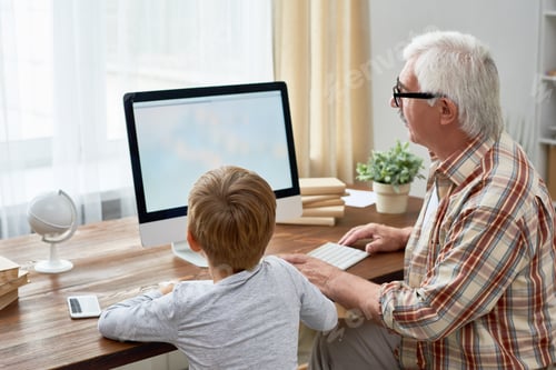 Preview: Grandfather and Little Boy Using PC