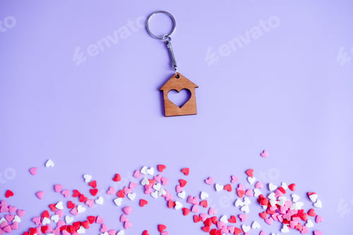 Preview: Valentine's day concept many small hearts and keychain on purple background