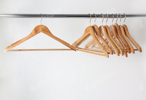 Preview: Wooden Clothes Hangers on a Metal Rod