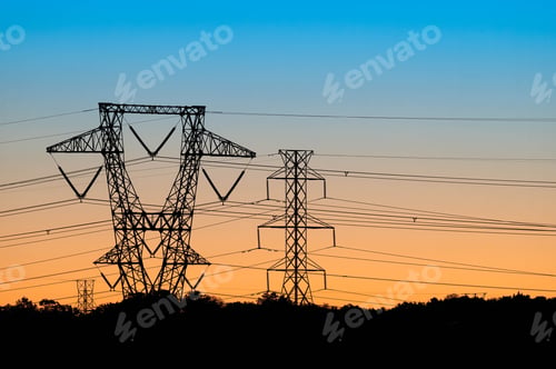 Preview: Beautiful shot of silhouettes of power lines during a sunrise