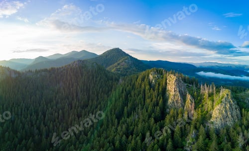 Preview: Peak of Rhodope mountain with forests against background of clouds. Panorama, top view