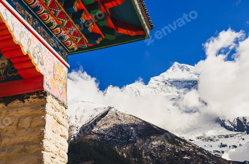 Preview: Himalayas mountain peak and buddhist temple colorful roof, Nepal