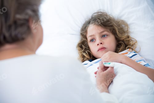 Preview: Grandmother taking care of her sick small grandson