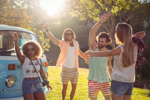 Preview: Group of friends dancing in the park
