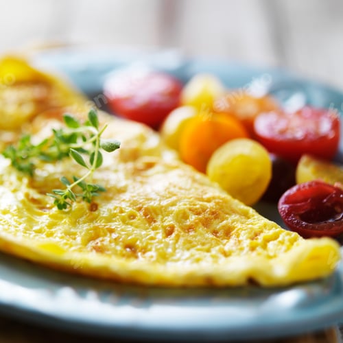 Preview: breakfast omelet with heirloom tomatoes close up