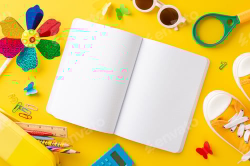 Preview: Early childhood learning theme. Overhead shot of educational tools - sketchbook, crayons, clips