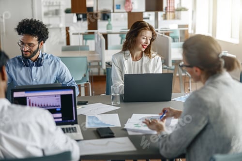 Preview: Busy coworkers cooperating and working together at office meeting, teamwork concept