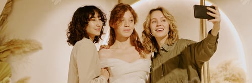 Preview: Header with Women Taking Selfie Together