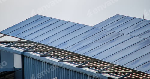 Preview: Solar panels attached to the roof of a building