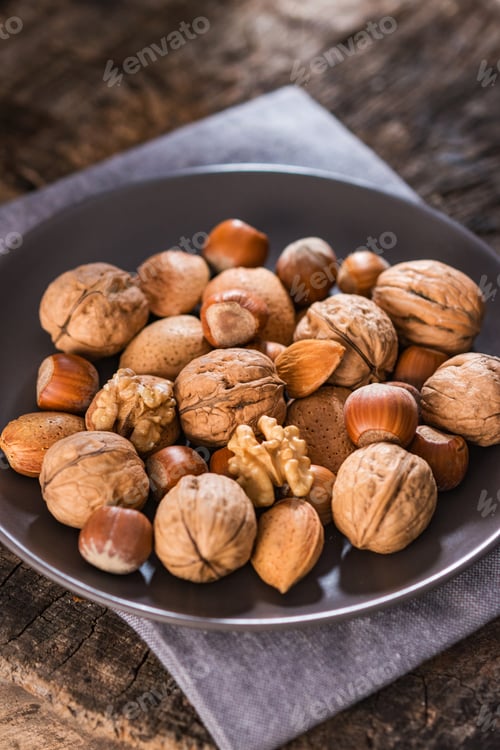 Preview: Mixed Nuts on Rustic Wooden Table