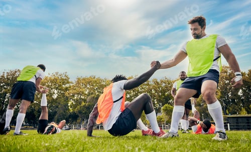 Preview: Teamwork, helping hand or rugby men in training, exercise or workout in practice match on grass fie