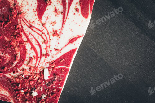 Preview: Top view on red and white appetizing dessert on wooden surface
