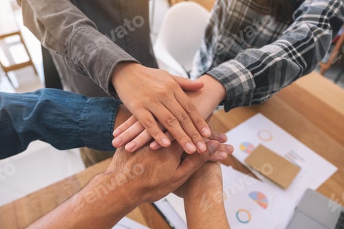 Preview: Businessman putting their hands together in the meeting