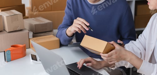 Preview: Couple Managing Small Online Business from Home, Packing Products for Shipping, E-commerce