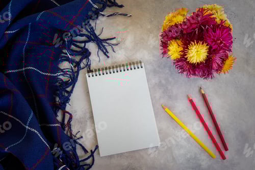 Preview: Autumn composition. Chrysanthemums notepad plaid top view flat lay.